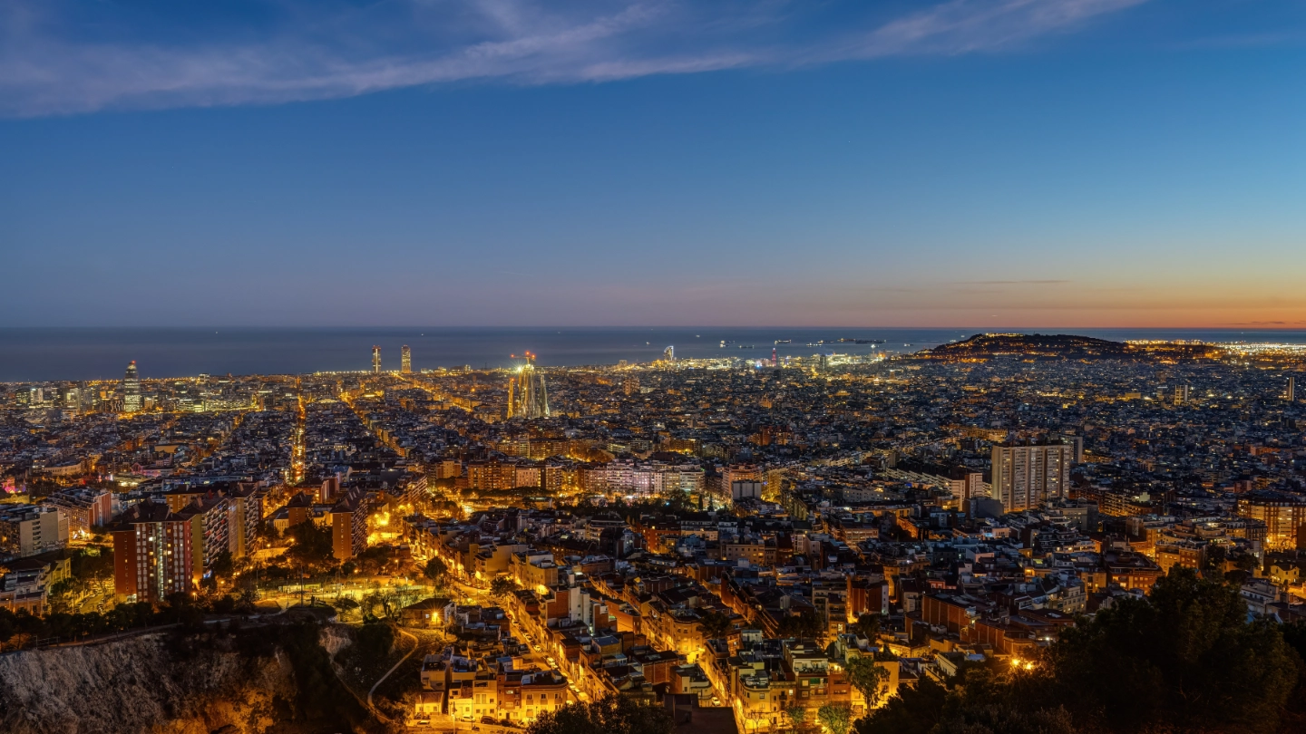 View over the city of Barcelona at twilight image
