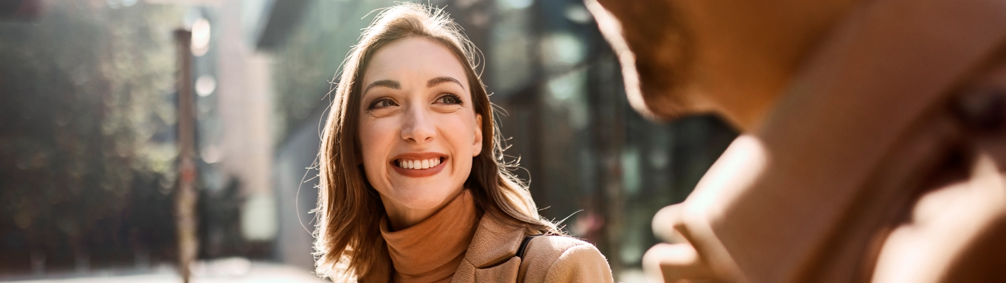 young woman smiling at man