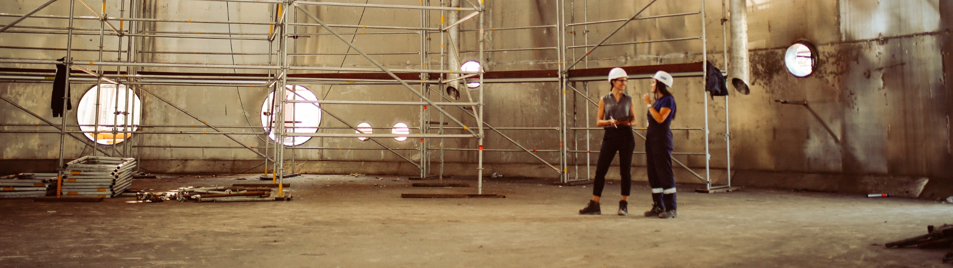 Two female construction workers talking